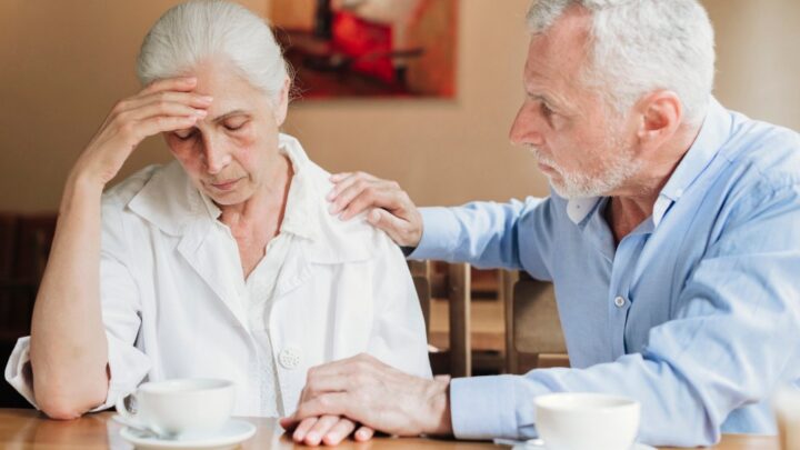 man consoling woman